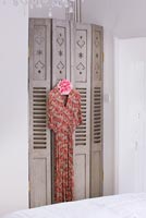 French folding shutters and vintage dress