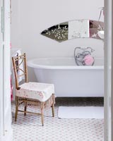 Classic bath and vintage chair