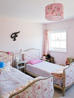 Vintage beds in girl's bedroom