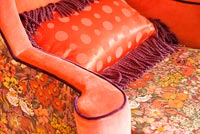 Patterned orange armchair detail