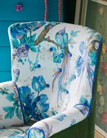 Armchair covered in Sanderson fabric designed by Velvet Eccentric