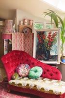 Chaise lounge by Velvet Eccentric with vintage painting and 1930s screen