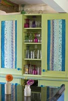 Hand painted kitchen cupboard decorated with Indian papers