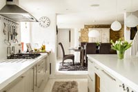 Modern open plan kitchen with corian worktop