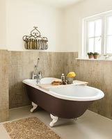 Roll top bath and wood effect tiles