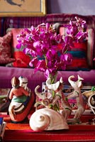 Asian sculptures on coffee table