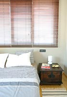 Modern bedroom with venetian blinds