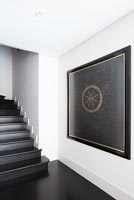 Modern black painting in hall