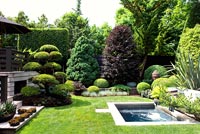 Formal country garden with small pond