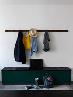 Hall storage with bench seat and coat hangers