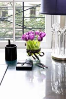 Pink Tulips on glass desk