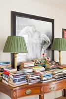Books on antique side table