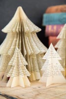 Using old books to create unique Christmas tree decorations - finished trees