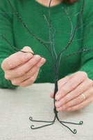 Using cotton wool and garden wire to create a Christmas tree - Bending branches to shape