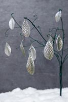 Using cotton wool and garden wire to create a Christmas tree - finished wire tree with Cotoneaster leaves