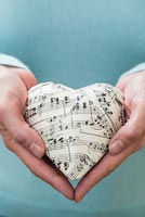 Heart decoration made from old sheet music