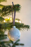 Create a simple Christmas bauble using newspaper - finished decoration
