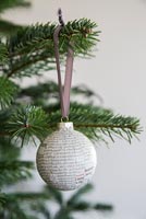 Create a simple Christmas bauble using newspaper - finished decoration
