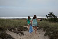 Girls walking towards beach