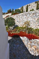 Traditional stone walls in terraced garden