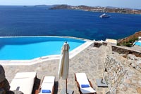 Luxury swimming pool overlooking sea