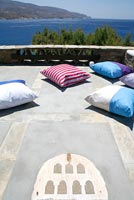 Colourful cushions on patio