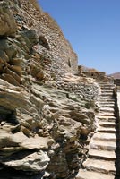 Stone stairs through rock garden