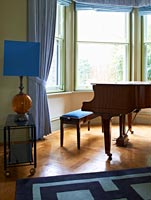 Grand piano by window