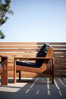 Wooden armchair on terrace