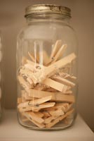 Wooden pegs in jar