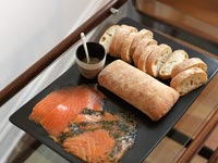 Smoked salmon and ciabatta on black platter