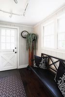 Country hallway with wooden bench