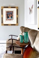 Velvet armchairs and framed Picasso print