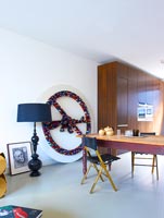 Modern open plan apartment with artwork by Ryan McElhinney