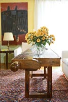Yellow Chrysanthemums on coffee table