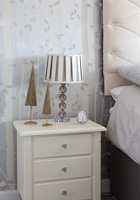 Christmas decorations on bedside cabinet
