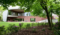 Contemporary house and lawned garden