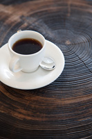 Coffee on rustic wooden coffee table