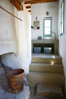 Steps up to traditional bathroom