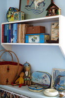 Vintage tins and accessories displayed on shelves