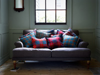Tartan cushions on grey sofa