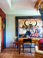 Large painting by dining table