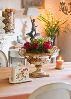 Ornate vintage urn with Cyclamen