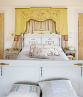 Decorative vintage bed and silk canopy
