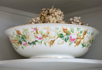 Vintage ceramic washbowl with dried Hydrangea flowers
