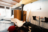 Open plan apartment with designer furniture