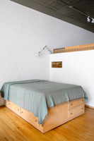Wooden bed with storage underneath