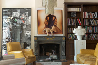 Modern art in living room - Ceramic dog sculpture by Gerard Drouillet, 2010 , 'A Dream of China' photo by Wangjin and  painting 'The Barbarians' by Ester Partegas