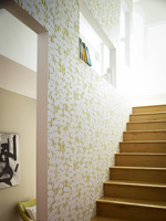 Patterned wallpaper on stairwell