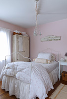 Vintage bed in girls bedroom